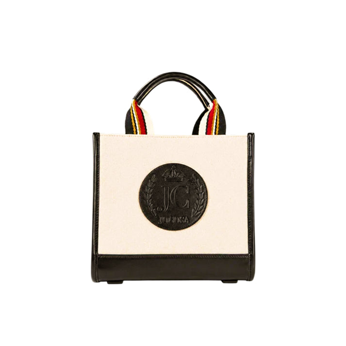 JOCOSA Club Tote in ivory canvas with black leather trim, black, red and ivory striped handles and embossed leather logo.